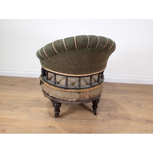 331 - A Victorian ebonised swivel Tub Chair with reeded spindle back and turned supports 2ft 4in H (in nee... 