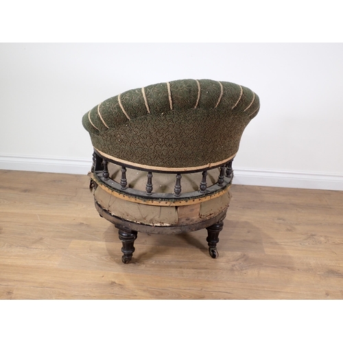 331 - A Victorian ebonised swivel Tub Chair with reeded spindle back and turned supports 2ft 4in H (in nee... 