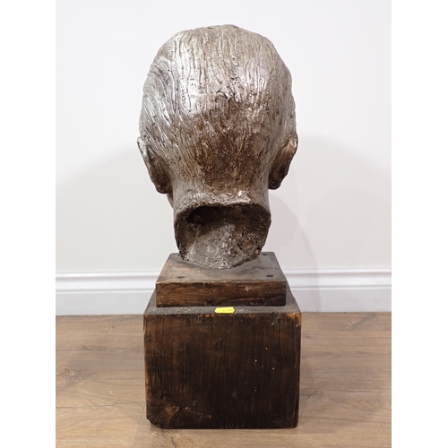 335 - A bronze effect Sculpture of a male head on stand 1ft 10in H