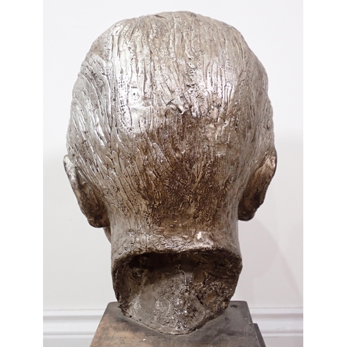 335 - A bronze effect Sculpture of a male head on stand 1ft 10in H