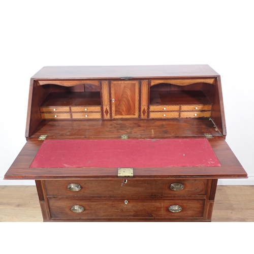 343 - A George III mahogany and satinwood strung Bureau, the fall front enclosing ten satinwood drawers an... 