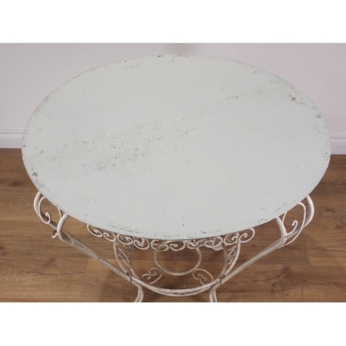 346 - A white painted metal circular Garden Table 2ft 9in D x 2ft 3in H