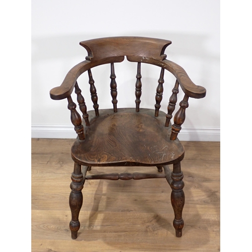 367 - A Victorian beech and elm Smoker's Bow Elbow Chair 2ft 8in H x 2ft 1in W