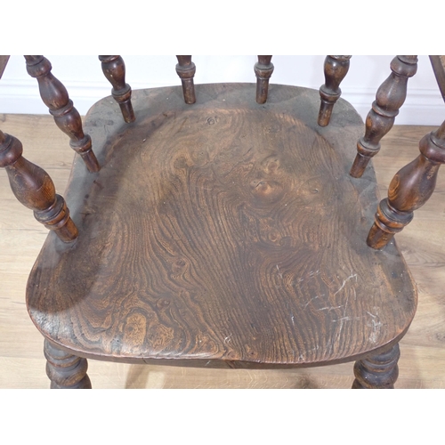 367 - A Victorian beech and elm Smoker's Bow Elbow Chair 2ft 8in H x 2ft 1in W