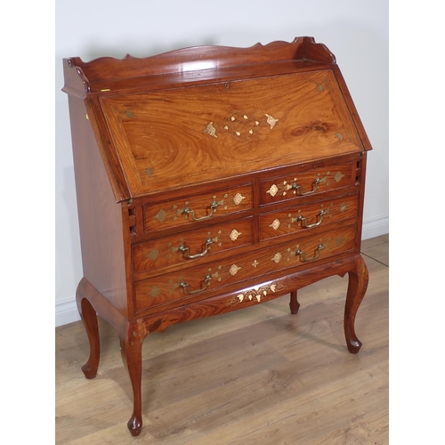 369 - A 20th Century hardwood and brass inlaid Bureau with fall front above four short and one long drawer... 