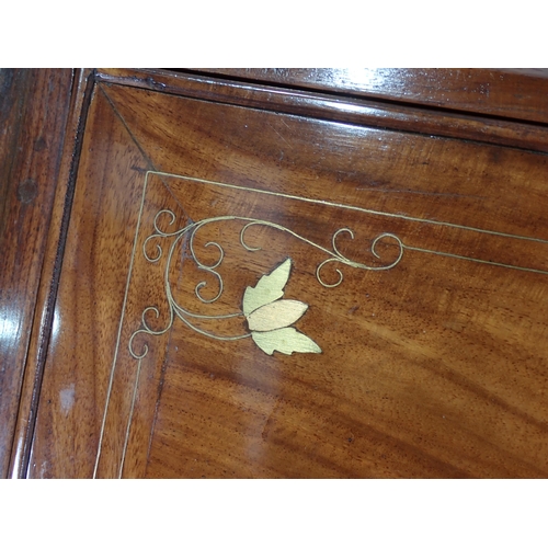 369 - A 20th Century hardwood and brass inlaid Bureau with fall front above four short and one long drawer... 