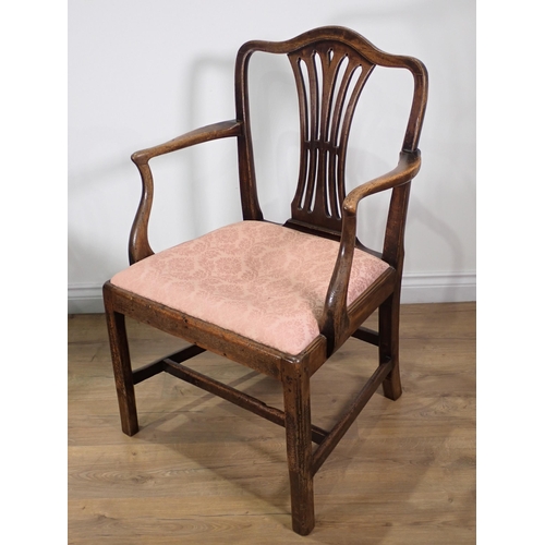 386 - A Georgian mahogany Elbow Chair and a 19th Century mahogany pierced splat back Chair