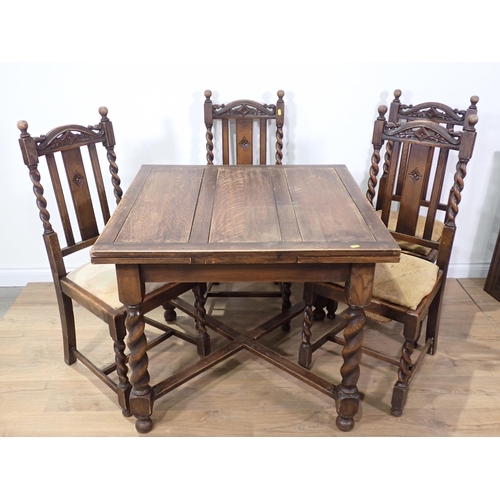 393 - An oak draw leaf Dining Table on barley twist supports, four Dining Chairs and a Court Cupboard