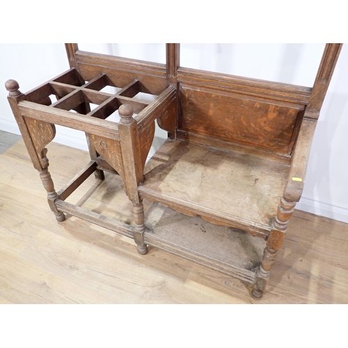 395 - An Edwardian oak mirror back Hall Stand and bench 7ft H x 4ft W