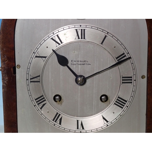 43 - A mahogany cased Mantel Clock with silvered dial by Emanuel, Southampton 11in H x 8in W