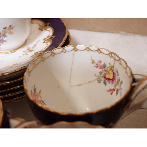 457 - A collection of Royal Crown Derby Coffee Cans and Saucers and a Derby style gily part Tea Service