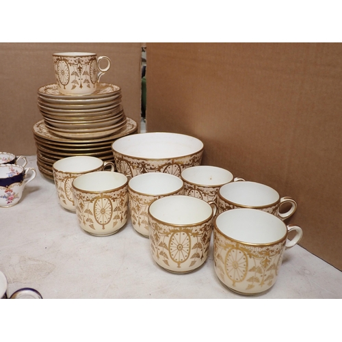 457 - A collection of Royal Crown Derby Coffee Cans and Saucers and a Derby style gily part Tea Service