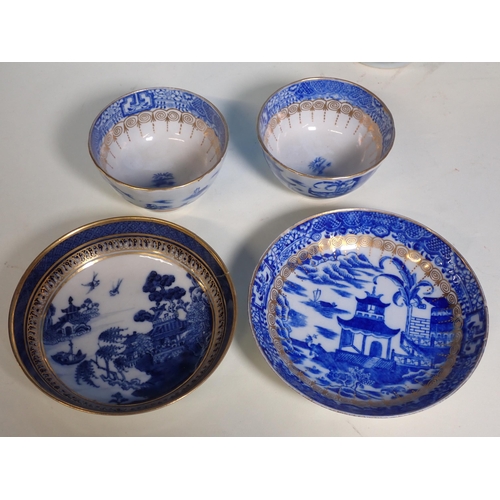 463 - Two Nanking Cargo Bowls with Christies labels, a New Hall Tea Cup and Saucer, two blue and white Tea... 