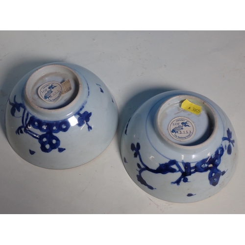 463 - Two Nanking Cargo Bowls with Christies labels, a New Hall Tea Cup and Saucer, two blue and white Tea... 