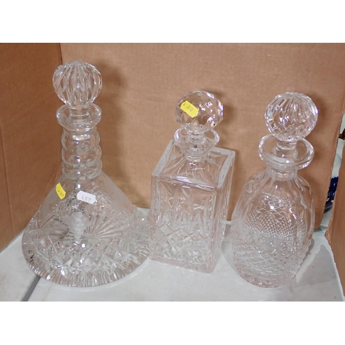 487 - Three cut glass Decanters and various Drinking Glasses