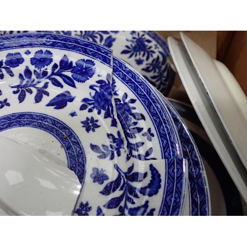 518 - An antique blue and white extensive Dinner Service including Meat Plates Tureens, Plates, etc.