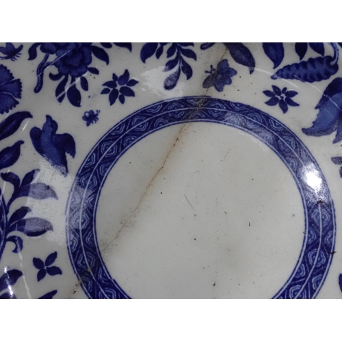 518 - An antique blue and white extensive Dinner Service including Meat Plates Tureens, Plates, etc.