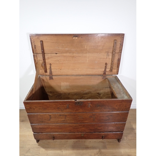 534 - An 18th Century elm Mule Chest of plank construction  with studwork date '1745' fitted lower drawer ... 