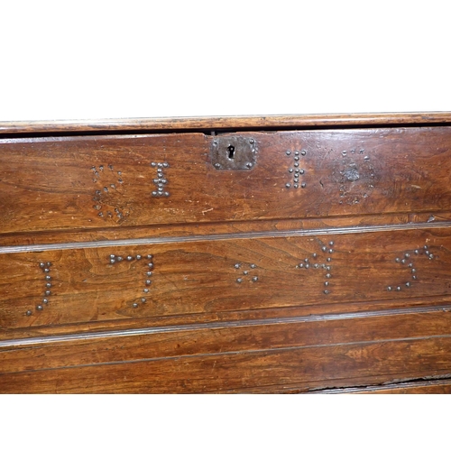 534 - An 18th Century elm Mule Chest of plank construction  with studwork date '1745' fitted lower drawer ... 