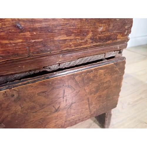 534 - An 18th Century elm Mule Chest of plank construction  with studwork date '1745' fitted lower drawer ... 