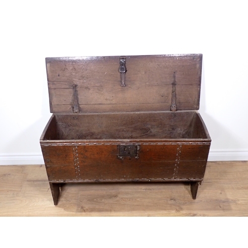 549 - A 17th Century oak six plank Chest with thumb cut strap design mounted on V-cut end supports 3ft 3in... 