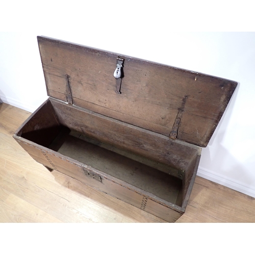 549 - A 17th Century oak six plank Chest with thumb cut strap design mounted on V-cut end supports 3ft 3in... 