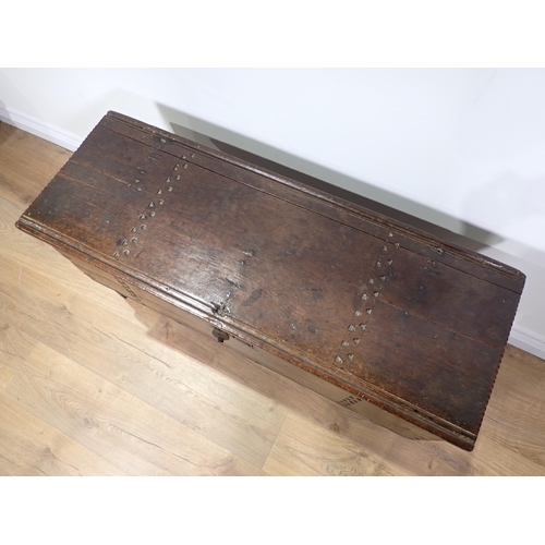 549 - A 17th Century oak six plank Chest with thumb cut strap design mounted on V-cut end supports 3ft 3in... 