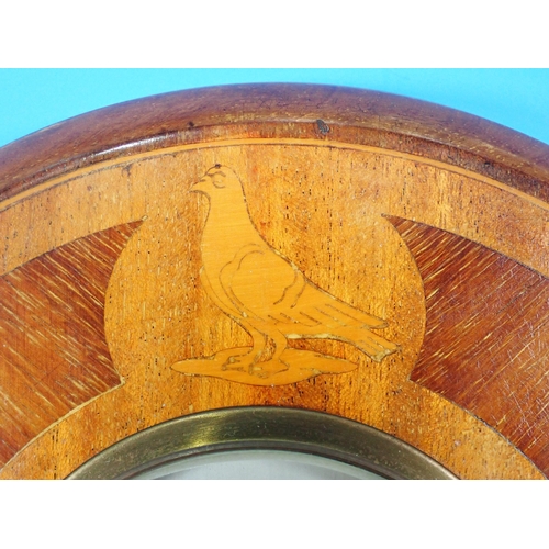 561 - A mahogany circular aneroid Barometer with inlay of racing pigeons 9in D