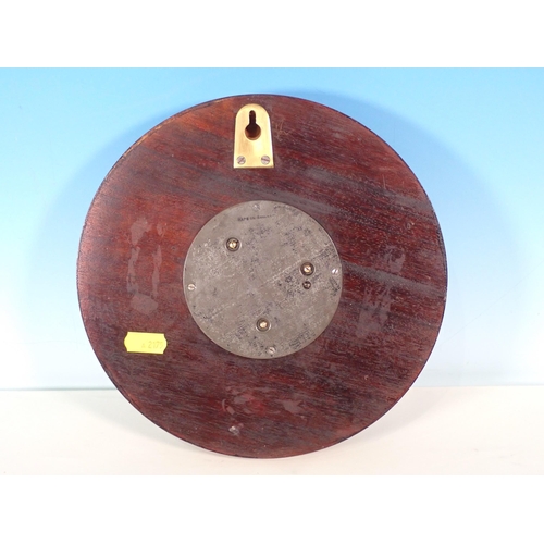 561 - A mahogany circular aneroid Barometer with inlay of racing pigeons 9in D