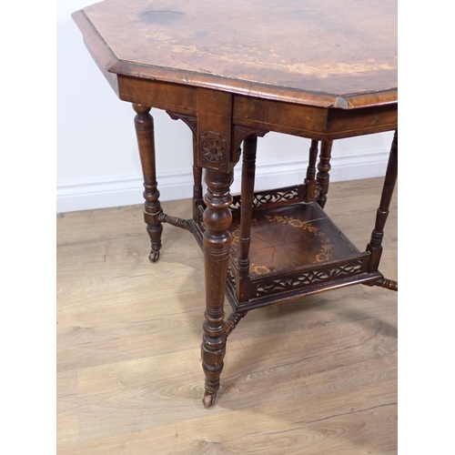 573 - A Victorian walnut and marquetry inlaid octagonal Centre Table with trailing leafage design mounted ... 