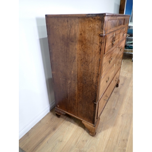 576 - A 19th Century mahogany Chest fitted three shallow drawers above two short and three long drawers fl... 