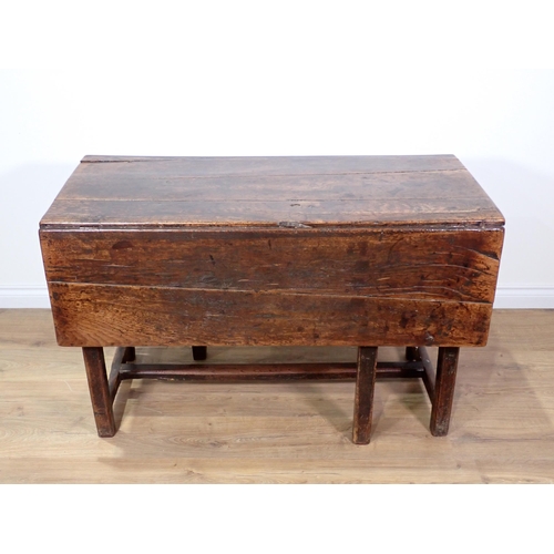 584 - An 18th Century and later dropleaf Table fitted drawer to each end mounted upon square cut chamfered... 