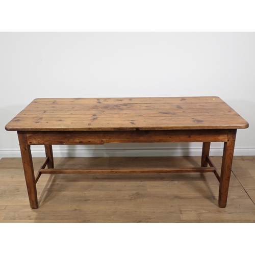 590 - A 19th Century pine Farmhouse Table fitted end drawer with four plank top mounted upon square cut su... 