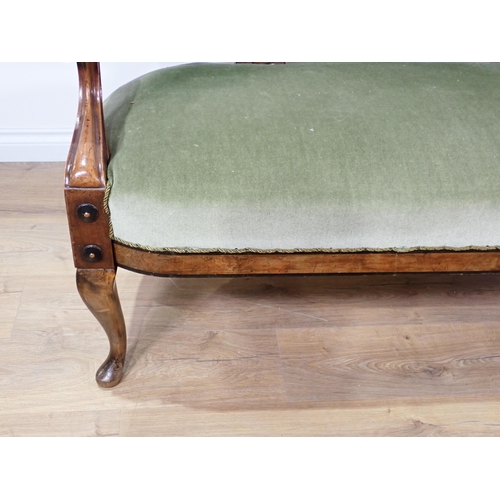 595 - An Aesthetic style walnut and ebony strung Sofa with green button upholstery 4ft 6in W x 3ft 1in H