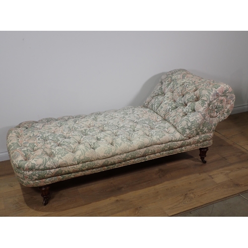 598 - A Victorian floral button upholstered Chaise Lounge on reeded supports 5ft 8in L x 2ft 4in H