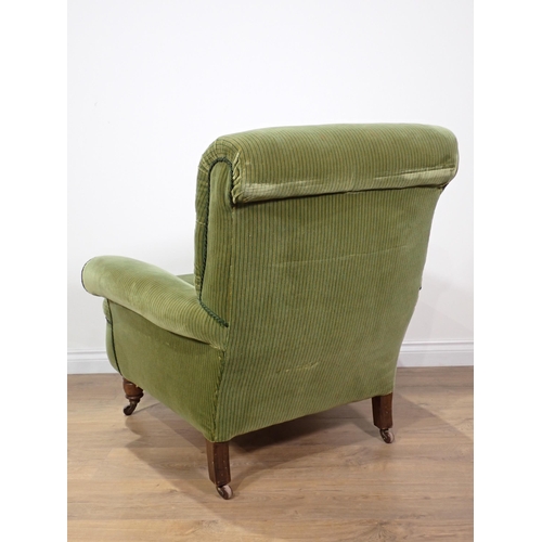 6 - A 19th Century green button upholstered Armchair on turned oak supports 3ft H x 2ft 9in W