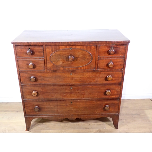 612 - A Victorian mahogany Chest of drawers fitted two banks of short drawers flanking single hat drawer o... 