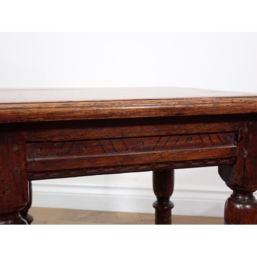 612A - An antique oak square Joint Stool in the 17th Century style mounted upon turned supports united by s... 