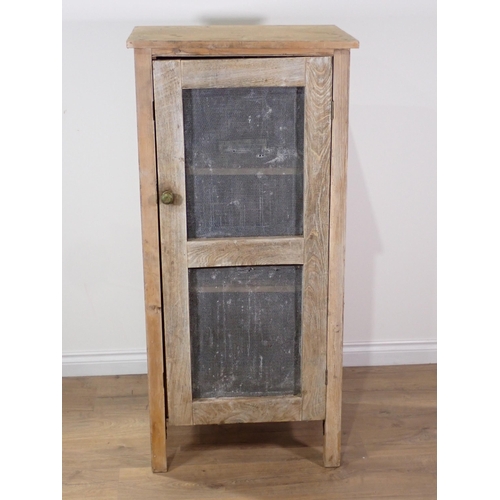 614 - An antique pine Food Cupboard with single gauze infilled door 4ft 7in H x 2ft 2in W