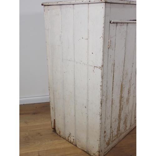 647 - An antique white painted pine two door Cupboard 3ft 9in H x 3ft 3in W