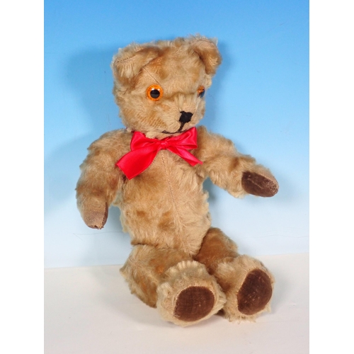 651 - A Teddy Bear with red bow 12in