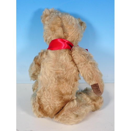 651 - A Teddy Bear with red bow 12in