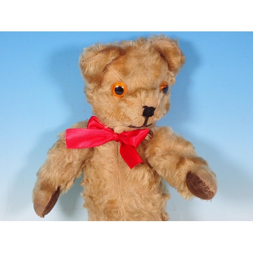 651 - A Teddy Bear with red bow 12in