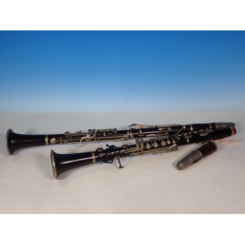 653 - A Besson & Co. Clarinet and an ebonised Clarinet