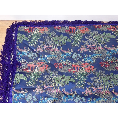 656 - A pair of Japanese silk deep blue Bed Covers with scenes of Pagodas within blossom filled trees 7ft ... 