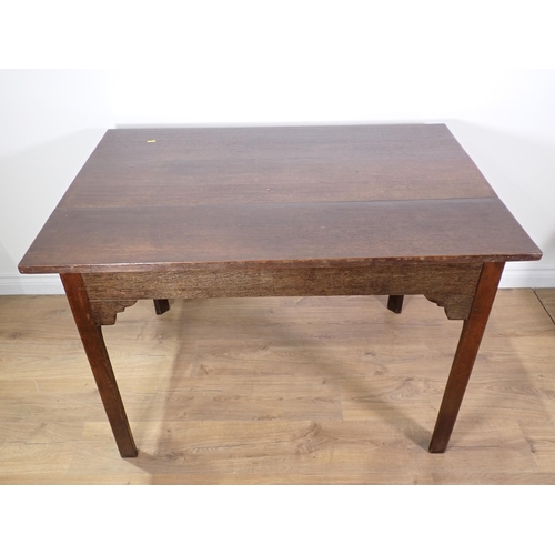 662 - A joined oak Kitchen Table with three plank top mounted on square cut supports 3ft 8in W x 2ft 5in H