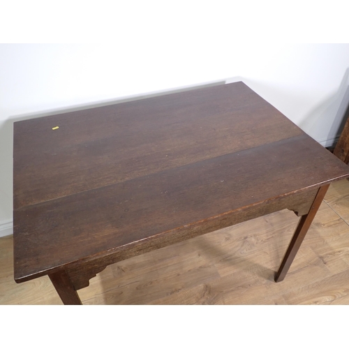 662 - A joined oak Kitchen Table with three plank top mounted on square cut supports 3ft 8in W x 2ft 5in H