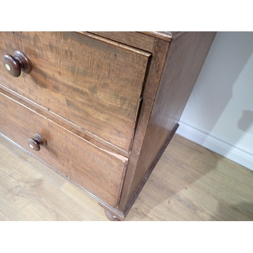 670 - A 19th Century mahogany Linen Press Cupboard with two small drawers above a pair of cupboard doors e... 