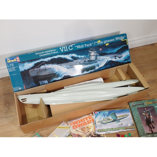 676 - A Revell plastic kit of a German Submarine and another, Fantasy magazines etc