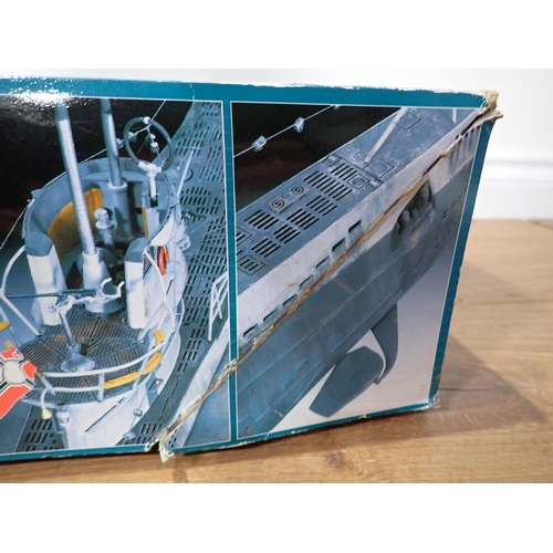 676 - A Revell plastic kit of a German Submarine and another, Fantasy magazines etc